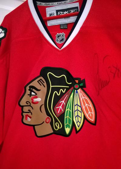 2010 Stanley cup winner CHRISTOBAL HUET (Blackhawks Goalie) signed jersey.