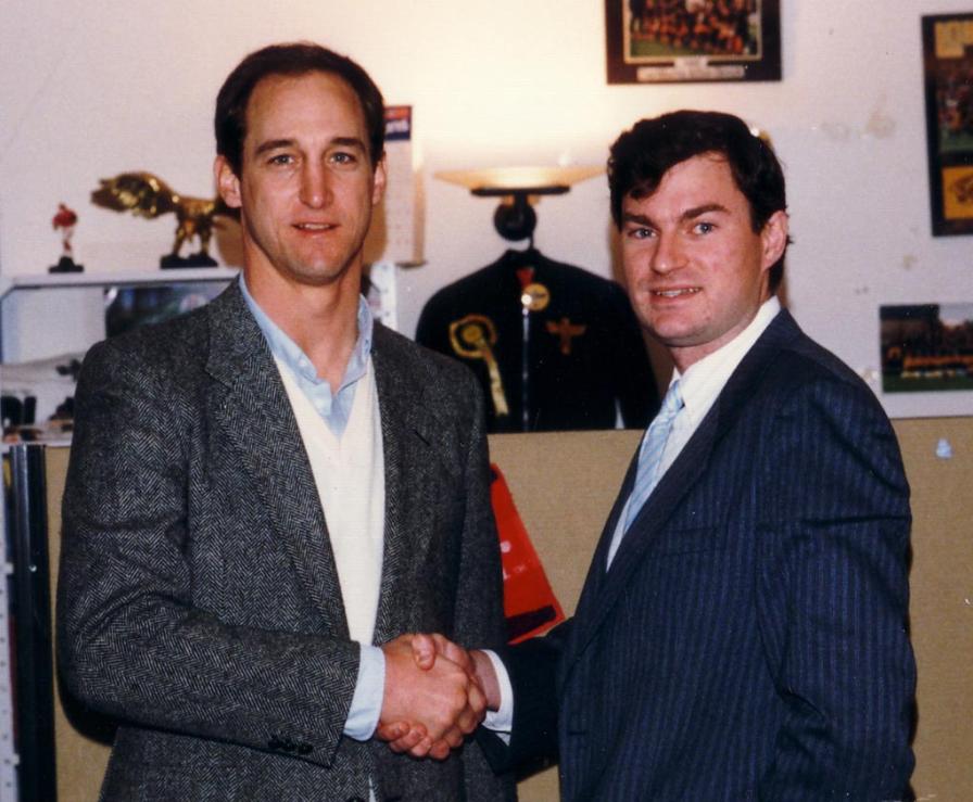 Colin Jarman and Steve Grogan (Patriots) in Budweiser League officee 